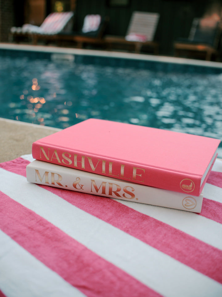 empty book on a pink table
