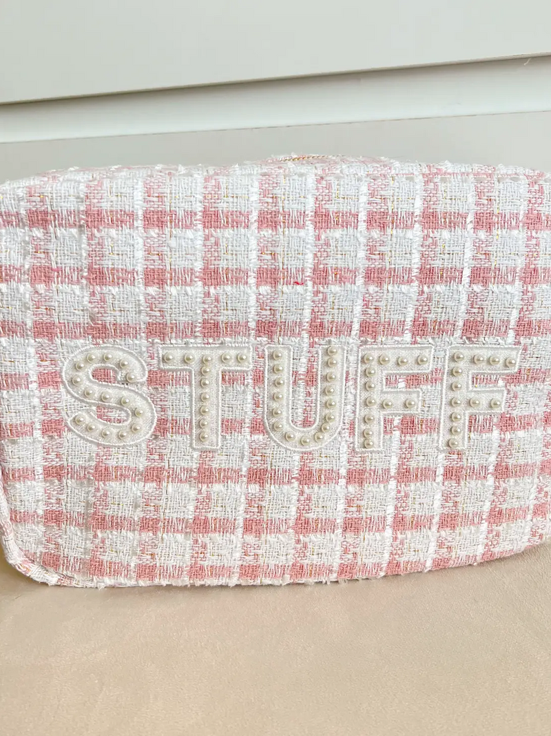 Pink and white tweed zippered make-up bag with pearl embellished letters spelling out STUFF