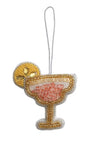 Beaded cocktail glass ornament on a white background